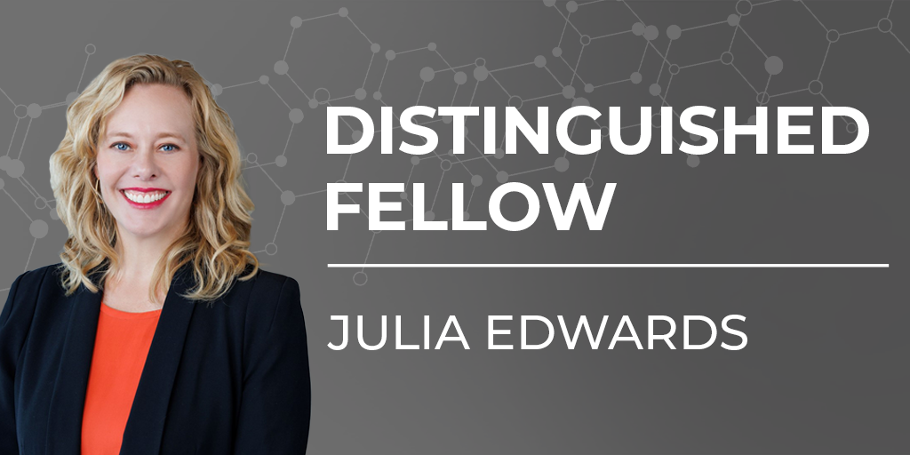 Professional headshot of female with text 'Distinguished Fellow Julia Edwards'