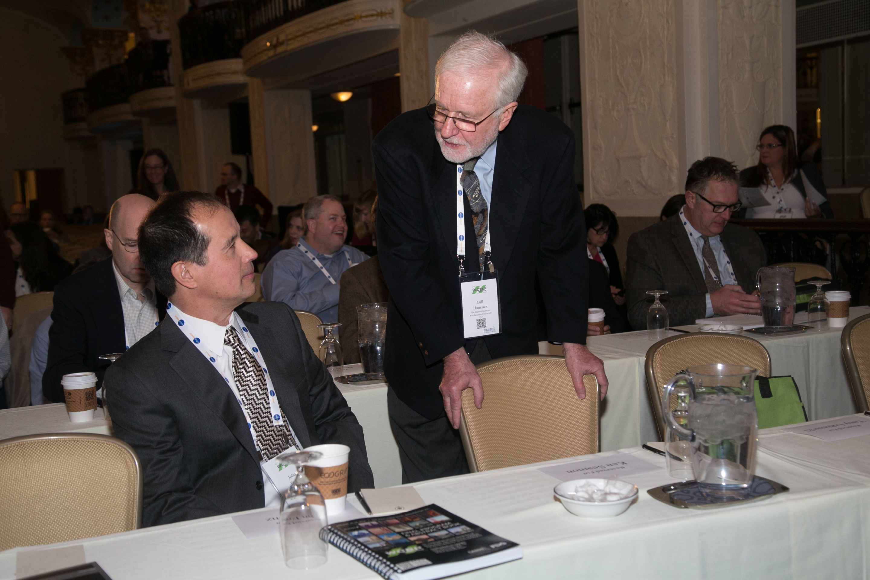 Photo of two male scientists networking at CASSS WCBP 2016.